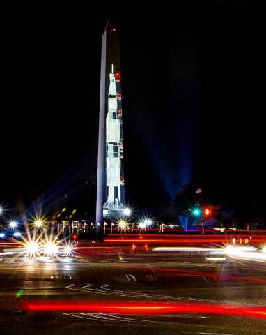 Saturn V rocket projected onto the Washington Monument in Washington, D.C.