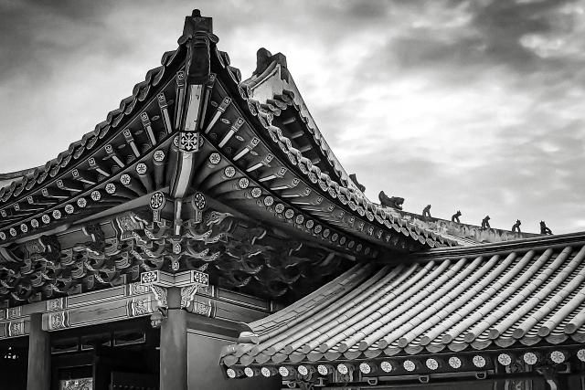 Roofline of an Asia building in black and white